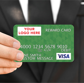 Man in suit holding Visa card